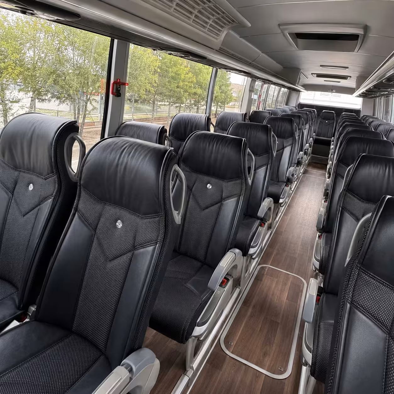 corporate sporting event charter buses and fan travel in lansing