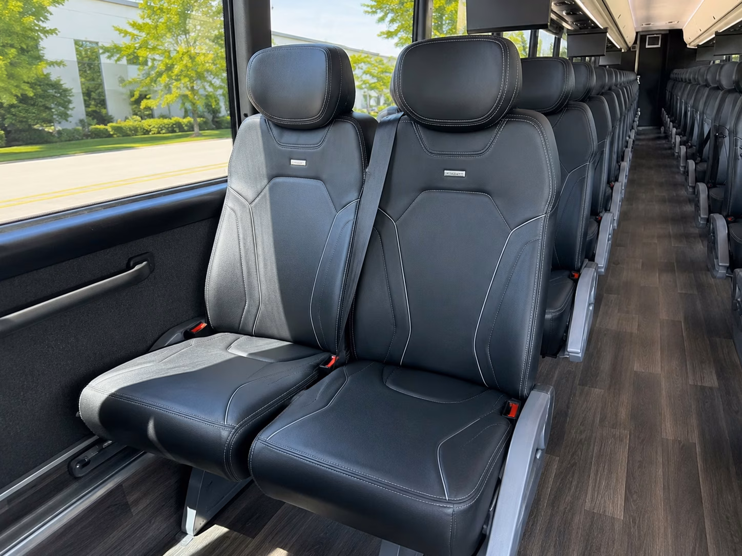 does the day of the week change what a charter bus costs in lansing michigan