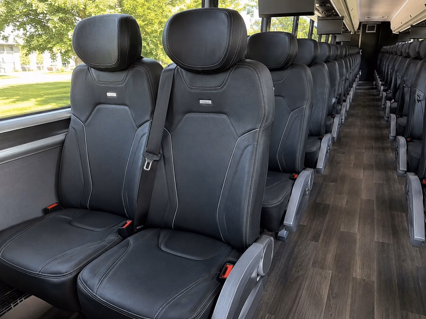 how trip distance and duration affect your lansing bus rental rate