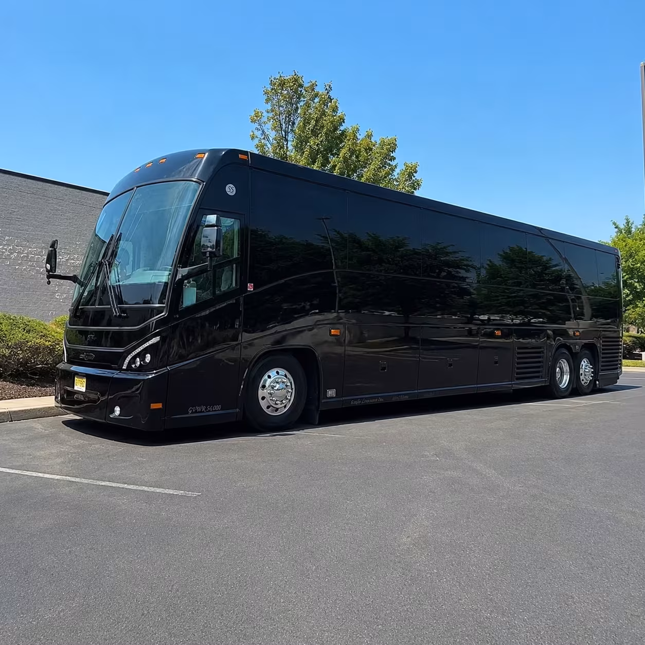 lansing 56 passenger charter bus rental