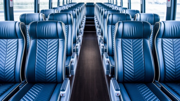 lansing 50 passenger charter bus rental