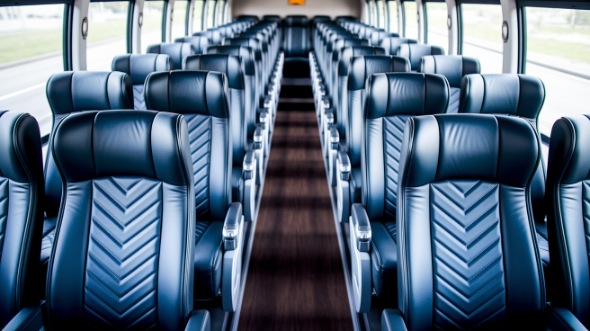 lansing 55 passenger charter bus rental
