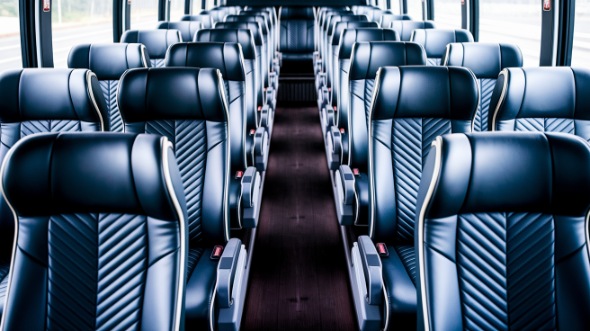 lansing 56 passenger charter bus rental